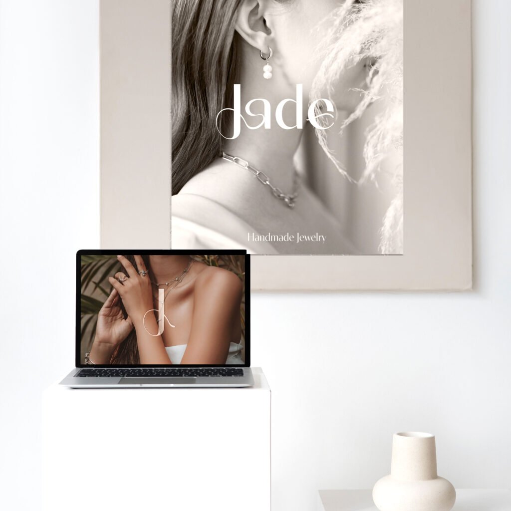 Feminine jewelry logo design for Jade, a handmade jewelry brand, featuring soft curves inspired by ring shapes and the natural lines of women’s bodies, expressing craftsmanship, elegance, and empowerment.