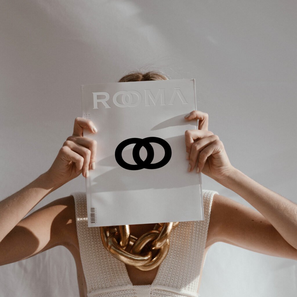 Italian clothing brand logo for Rooma featuring custom typography inspired by Roman architecture and timeless Italian craftsmanship, designed for a refined and contemporary fashion identity.