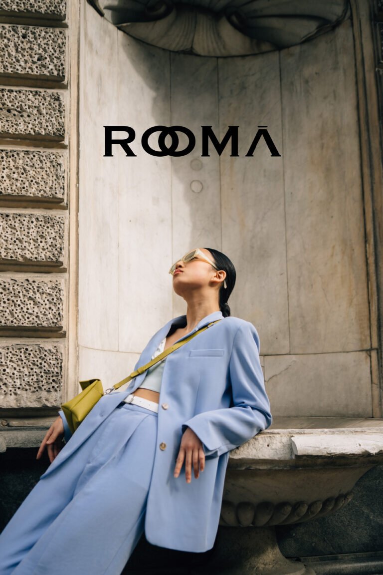 Italian clothing brand logo for Rooma featuring custom typography inspired by Roman architecture and timeless Italian craftsmanship, designed for a refined and contemporary fashion identity.