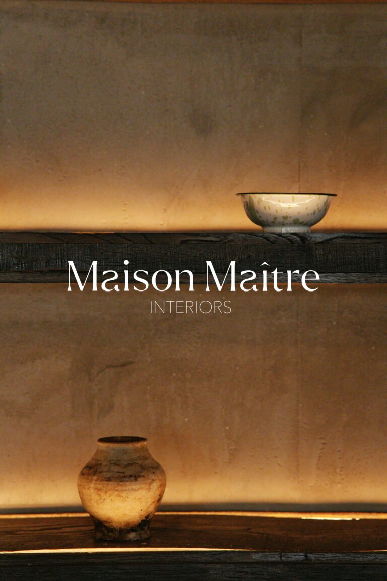 Luxury interior design logo for Maison Maître featuring a minimalist maison de maître illustration and custom-designed typography, created for a refined and timeless brand identity.