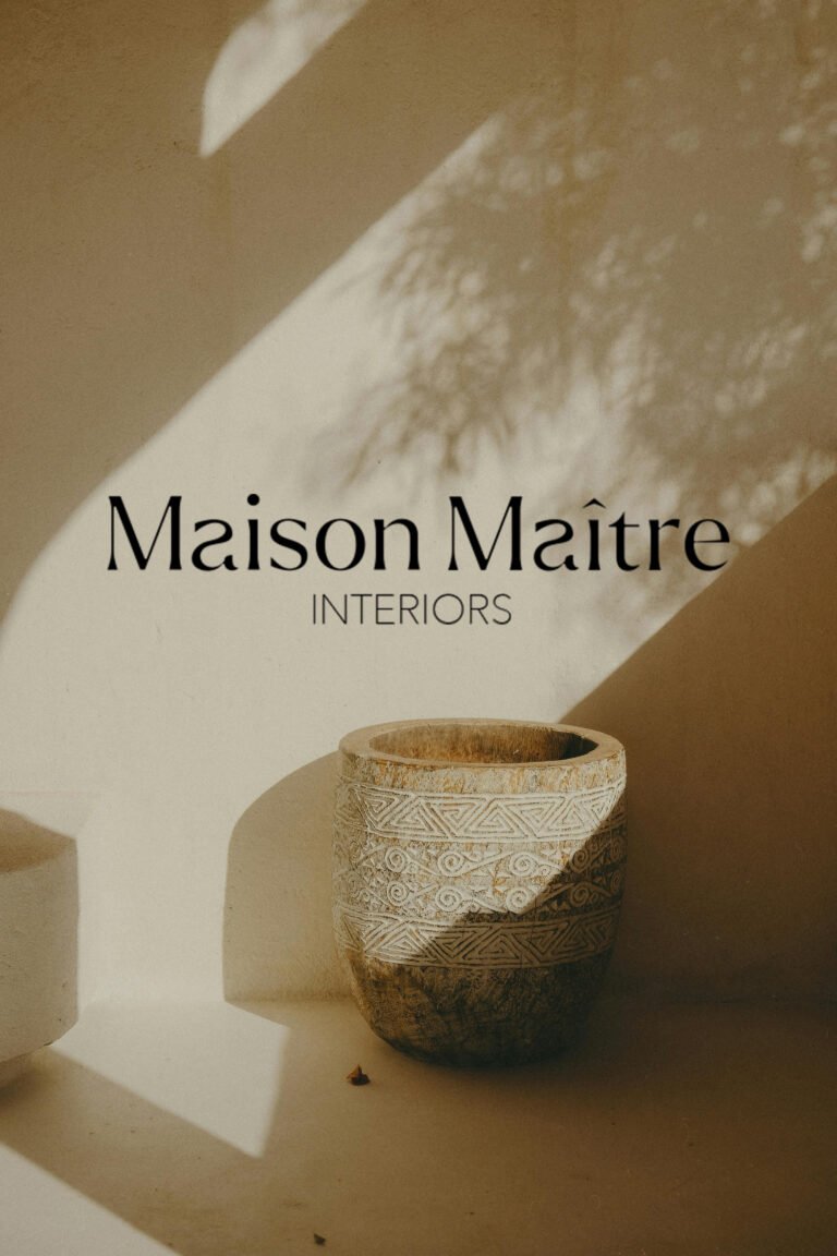Luxury interior design logo for Maison Maître featuring a minimalist maison de maître illustration and custom-designed typography, created for a refined and timeless brand identity.
