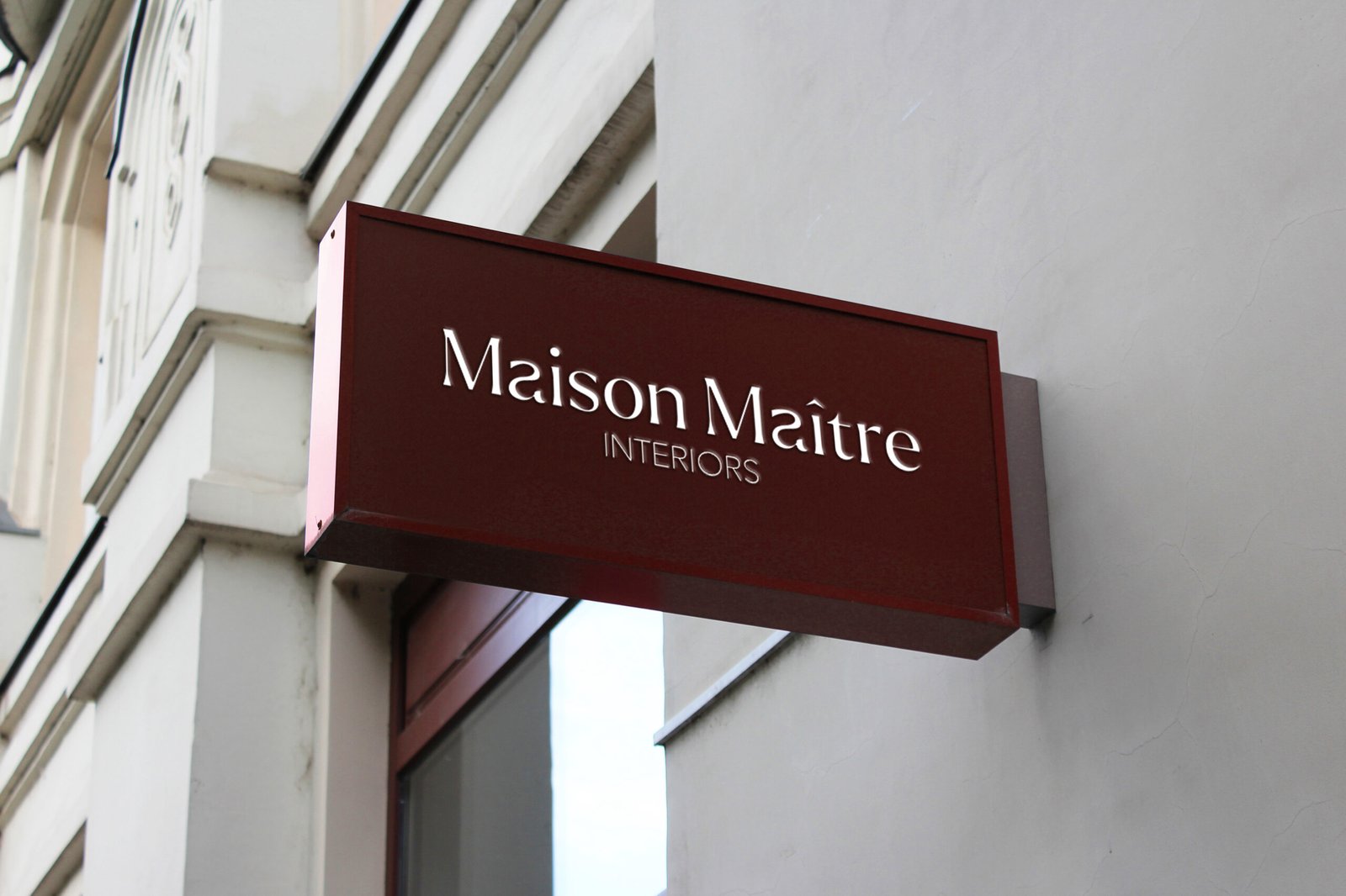 Luxury interior design logo for Maison Maître featuring a minimalist maison de maître illustration and custom-designed typography, created for a refined and timeless brand identity.