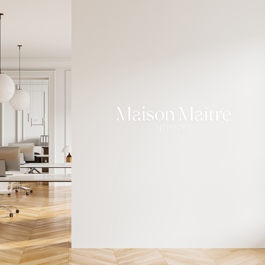Luxury interior design logo for Maison Maître featuring a minimalist maison de maître illustration and custom-designed typography, created for a refined and timeless brand identity.