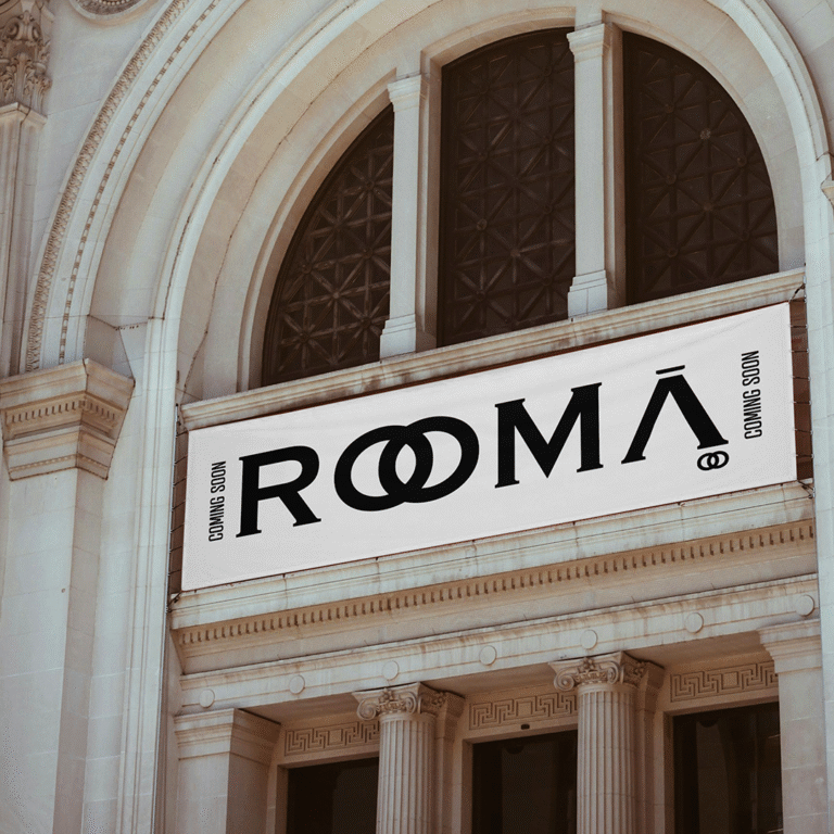Italian clothing brand logo for Rooma featuring custom typography inspired by Roman architecture and timeless Italian craftsmanship, designed for a refined and contemporary fashion identity.